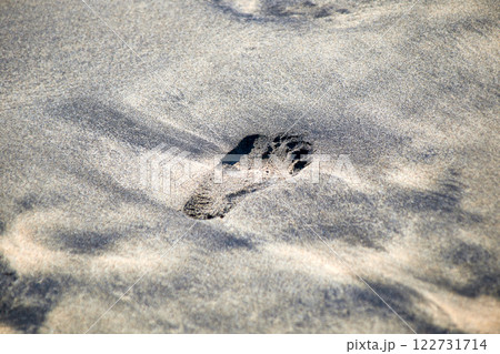 single footprint in the sand 122731714
