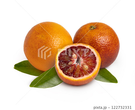 Blood red oranges and leaves isolated with clipping path. Blood red oranges and leaves isolated with clipping path. 122732331