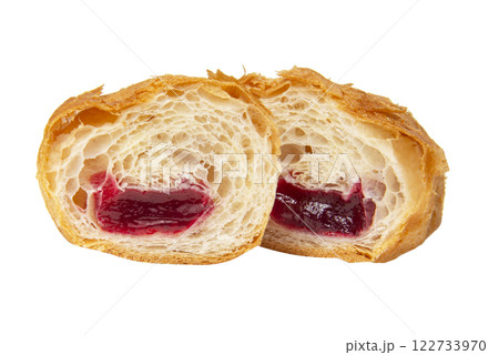 French croissant with cherry jam filling isolated on the white background French croissant with cherry jam filling isolated on the white background 122733970