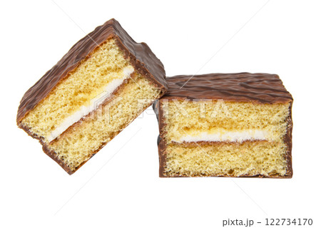 Biscuit cake with cream filling glazed chocolate isolated on the white Biscuit cake with cream filling glazed chocolate isolated on the white 122734170