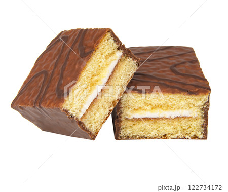 Biscuit cake with cream filling glazed chocolate isolated on the white 122734172