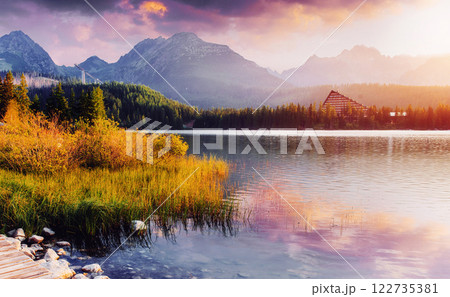 Majestic mountain lake in National Park High Tatra. Strbske pleso, Slovakia, Europe. Majestic mountain lake in National Park High Tatra. Strbske pleso, Slovakia, Europe. 122735381