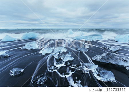 Jokulsarlon glacier lagoon, fantastic sunset on the black beach, Iceland Jokulsarlon glacier lagoon, fantastic sunset on the black beach, Iceland 122735555