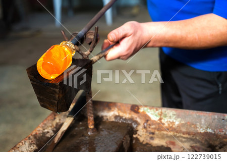 Handmade figures of melted glass - selective focus Handmade figures of melted glass - selective focus 122739015