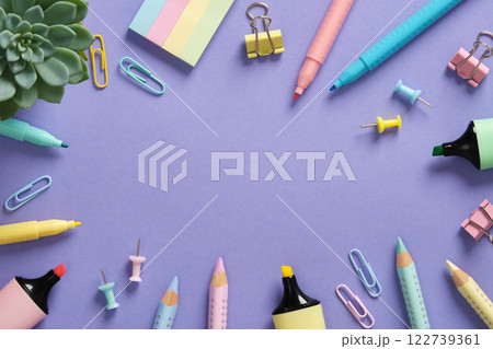 Stationery frame in pastel colors on a light purple background. Space for your message Stationery frame in pastel colors on a light purple background. Space for your message 122739361