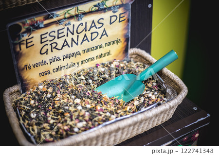 close up view of baskets with different kinds of tea in a herbal shop close up view of baskets with different kinds of tea in a herbal shop 122741348