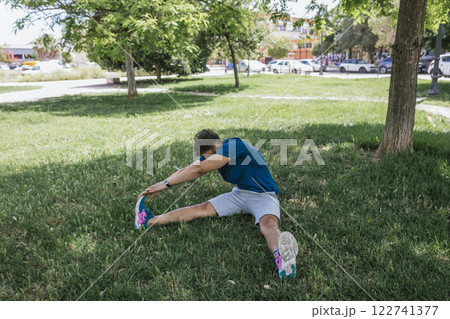 Young man practicing sports outside Young man practicing sports outside 122741377