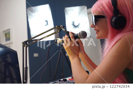 Beautiful young singer and musician broadcast from her home studio 122742034