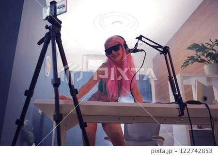 Beautiful young singer and musician broadcast from her home studio 122742858