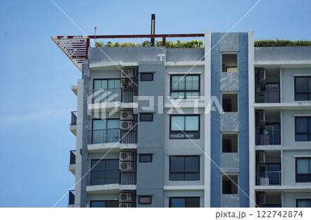 Detailed view of windows, doors and balconies of city buildings Detailed view of windows, doors and balconies of city buildings 122742874