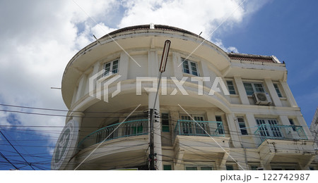 Detailed view of windows, doors and balconies of city buildings  122742987