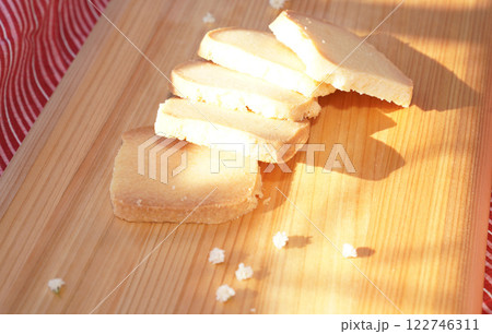 Homemade shortbread cookies on wood board. 122746311