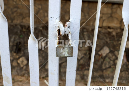 metal padlock for locking doors and gates in Israel. 122748216