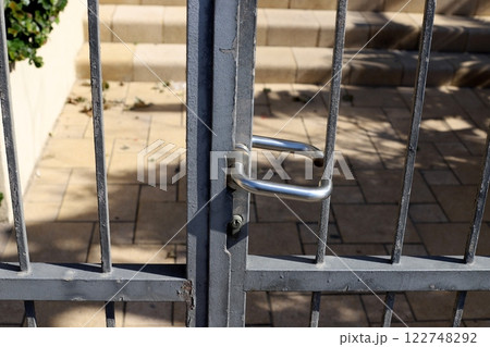 metal padlock for locking doors and gates in Israel. 122748292