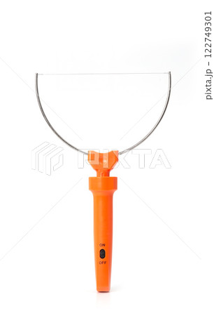Electric styrofoam cutter with an orange handle and a thin heated wire, isolated on a white background. 122749301