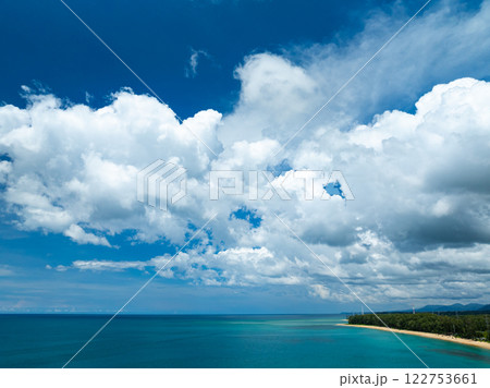 Aerial view Beautiful sea in summer season,Aerial flying drone view Waves water surface texture on sunny tropical ocean in Phuket island Thailand 122753661