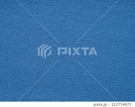 A serene expanse of textured blue felt creates a calm, minimalist backdrop A serene expanse of textured blue felt creates a calm, minimalist backdrop 122754972