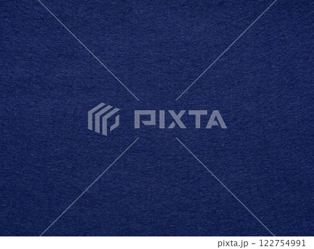 Deep navy blue felt texture conveys a sense of sophistication and depth, ideal for elegant and classic designs 122754991