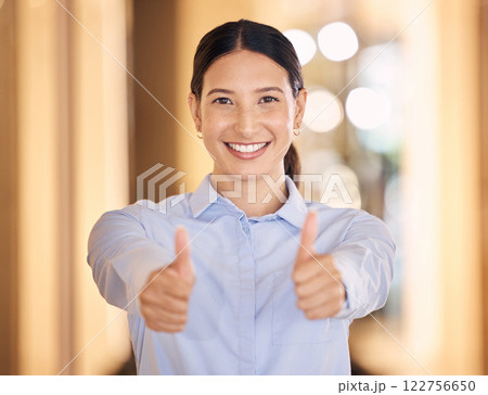Happy, woman and thumbs up hands for business, success or deal of an employee against a bokeh background. Portrait of female worker with hand gestures for thank you, great work and job well done. Happy, woman and thumbs up hands for business, success or deal of an employee against a bokeh background. Portrait of female worker with hand gestures for thank you, great work and job well done. 122756650
