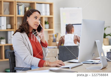 Corporate woman on phone call and computer typing, working on company management and business email. Mexico girl and online technology communication manager on 5g digital mobile smartphone at office 122756664