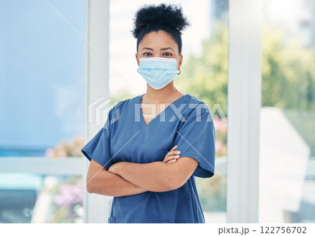 Nurse, healthcare black woman with a covid face mask in confident portrait. Innovation, leadership and proud medical nursing professional, surgeon or health employee with vision for success in career Nurse, healthcare black woman with a covid face mask in confident portrait. Innovation, leadership and proud medical nursing professional, surgeon or health employee with vision for success in career 122756702