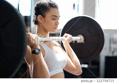 Woman fitness, motivation and barbell workout in wellness gym for sports training, exercising and healthy muscle growth. Weightlifting bodybuilder, personal trainer and people coach in exercise room Woman fitness, motivation and barbell workout in wellness gym for sports training, exercising and healthy muscle growth. Weightlifting bodybuilder, personal trainer and people coach in exercise room 122756715
