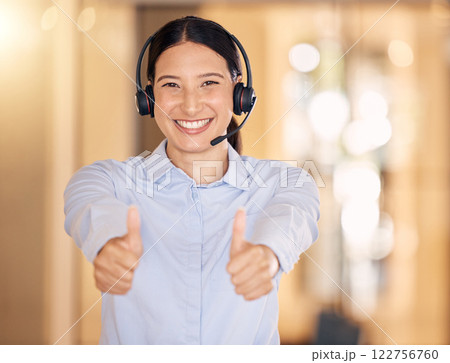 Thumbs up for success, success at call center company and hand sign for achievement in telemarketing industry at work. Portrait of a customer support worker helping, in agreement and support in sales Thumbs up for success, success at call center company and hand sign for achievement in telemarketing industry at work. Portrait of a customer support worker helping, in agreement and support in sales 122756760