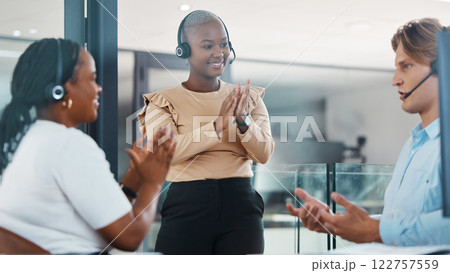 Call center support team clapping hands in congratulations and celebration for achievement and success. Happy telemarketing and customer service people in diversity, happiness and excited for leader 122757559