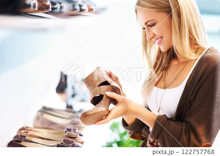 Shoes, fashion and woman shopping for retail designer high heels on sale, discount and promotion in luxury store. Money, smile and happy customer excited with footwear when buying shoes in the mall 122757768