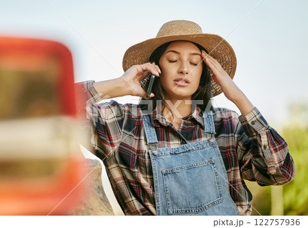 Farmer, stress and phone call with woman working in the agriculture industry hears bad news about crop sustainability. Countryside, green field worker anxious about economy growth on farming business Farmer, stress and phone call with woman working in the agriculture industry hears bad news about crop sustainability. Countryside, green field worker anxious about economy growth on farming business 122757936