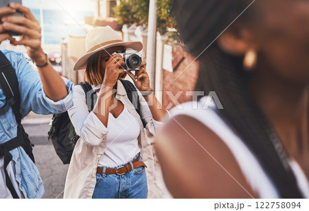 Travel, tourism and photograph with a woman tourist taking a picture while on holiday, vacation or weekend getaway. Memories, sightseeing and overseas with a young female using a camera abroad Travel, tourism and photograph with a woman tourist taking a picture while on holiday, vacation or weekend getaway. Memories, sightseeing and overseas with a young female using a camera abroad 122758094