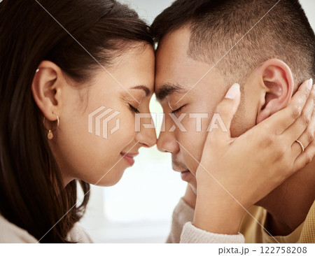 Dating, man and woman with foreheads against each other in a loving and affectionate closeup. In love, young male and female couple sharing a beautiful moment and smiling after their engagement. Dating, man and woman with foreheads against each other in a loving and affectionate closeup. In love, young male and female couple sharing a beautiful moment and smiling after their engagement. 122758208