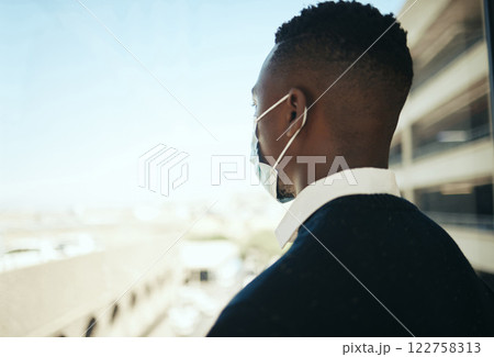 Black businessman with mask in city on business trip or travel for job opportunity success in covid pandemic. Young corporate career, professional man or manager at airport for management event 122758313