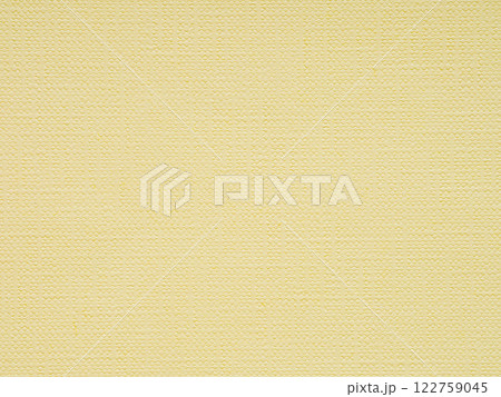 A warm, buttery yellow textured paper, reminiscent of soft sunlight and subtle cheer 122759045