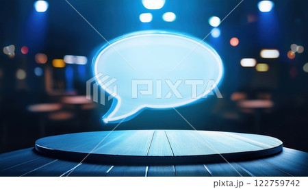 glowing speech bubble icon above round table symbolizes innovative conversation and creativity in modern setting. vibrant atmosphere enhances communication 122759742
