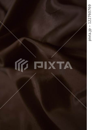 abstract background,  a wallpaper, fabric waves, color gradient, silk, satin Mocha Mousse color 122760769