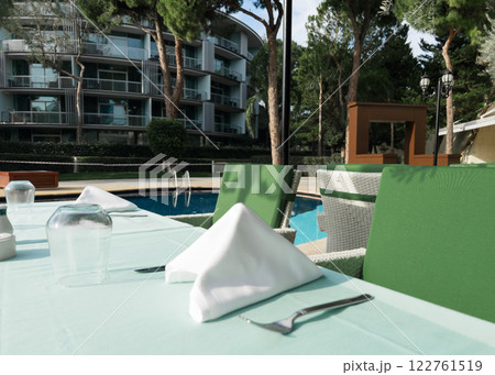 Cafe tables and chairs outside in Antalya Turkey hotel resort  122761519