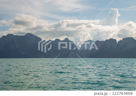 A beauty of Cheow Lan Dam or Rajjaprabha Dam Reservoir is in Khao Sok National Park in Surat Thani, Thailand A beauty of Cheow Lan Dam or Rajjaprabha Dam Reservoir is in Khao Sok National Park in Surat Thani, Thailand 122763609