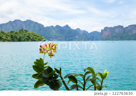 A beauty of Cheow Lan Dam or Rajjaprabha Dam Reservoir is in Khao Sok National Park in Surat Thani, Thailand A beauty of Cheow Lan Dam or Rajjaprabha Dam Reservoir is in Khao Sok National Park in Surat Thani, Thailand 122763630