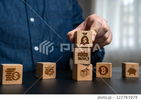 A businessman manages capital and financial resources. Investments and savings. Generate profit and save funds from being eaten up by inflation. Long-term savings. 122763978