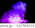 Purple and blue cloud of smoke is blowing in the wind 122764210