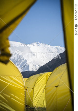 Vertical shot of view on Lenin Peak captured from expedition tent , Pamir Mountains, Kyrgyzstan 122764526
