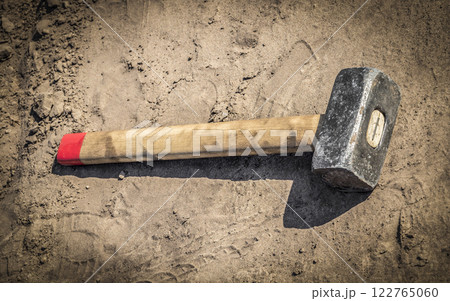 Hammer on the sand during rest 122765060