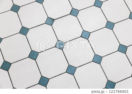 Vintage stone mosaic floor tiling with white and green squares pattern Vintage stone mosaic floor tiling with white and green squares pattern 122766801