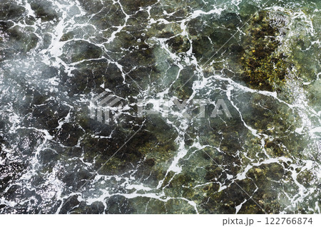 Stormy shallow sea water with waves and foam, top view 122766874
