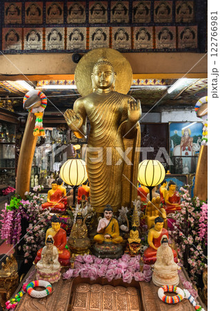 Buddha statue. Gangaramaya Temple, Colombo, Sri Lanka 122766981