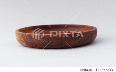 Wooden kitchen utensils stacked view close up isolated Wooden kitchen utensils stacked view close up isolated 122767833