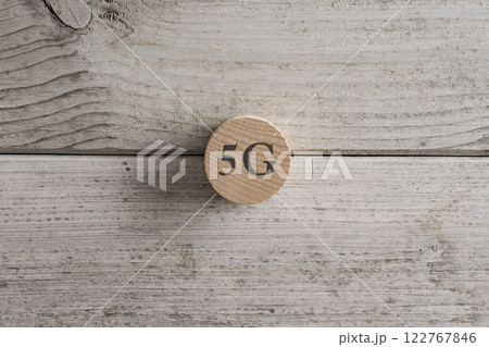 5G symbol on a wooden button 5G symbol on a wooden button 122767846