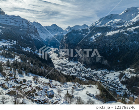 Lauterbrunnen Valley and Snowy Mountains in Winter. Switzerland. Aerial View 122768246