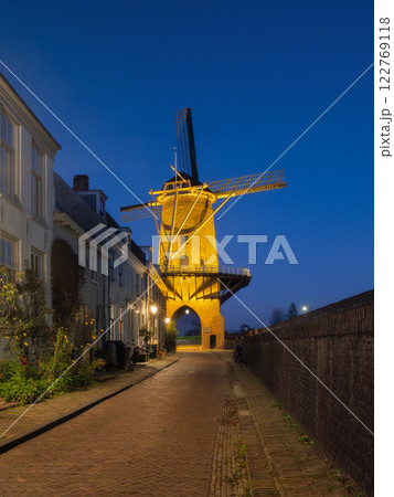Windmill in the Netherlands. Old historical buildings. Architectural landscape. 122769118
